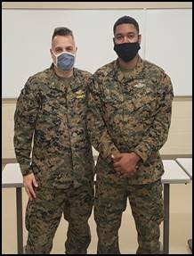 II MEF Surgeon Captain Hollis recognizes HM3 Thomas on his superior performance.